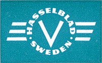 The "HASSELBLAD SWEDEN" winged-V logo as it appeared on the box of an "EXTENSION TUBE No. 20", dating from the 1950-1957 period.